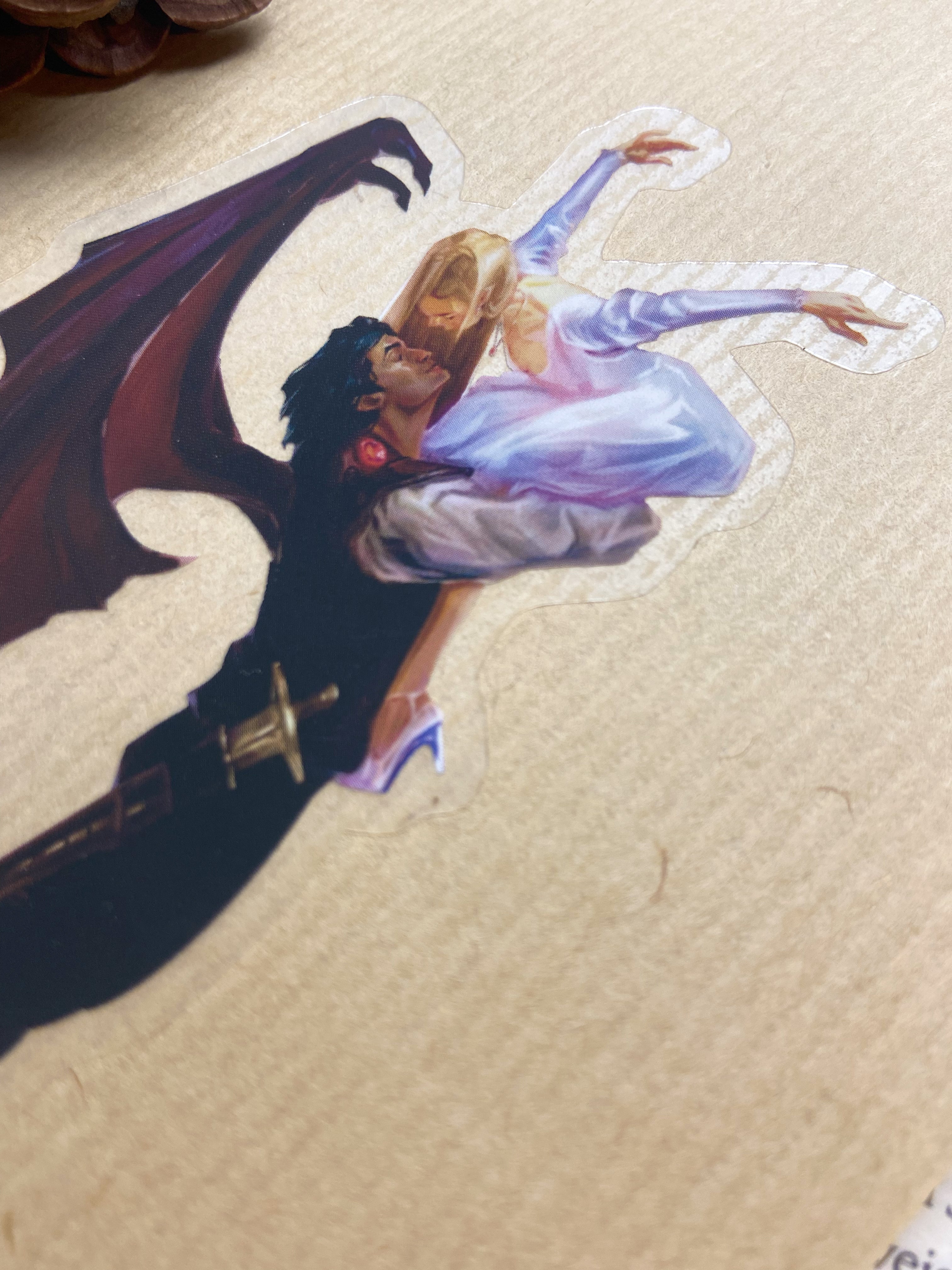 Close-up of A Dance in Silver Flames sticker, showcasing the intricate details of the character design inspired by Sarah J. Maas.